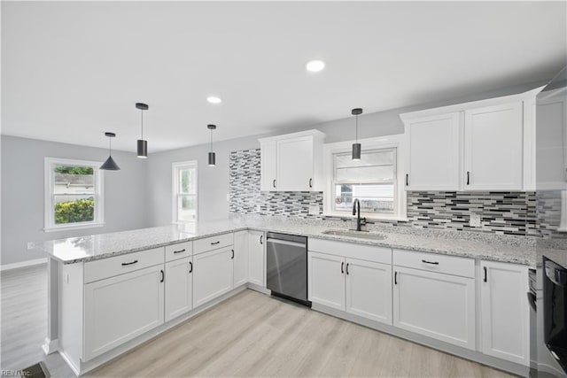 808 Williams Ave, Chesapeake, VA 23323 - kitchen featuring dishwasher, a peninsula, a sink, light wood-style flooring, and recessed lighting