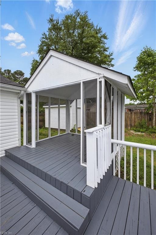 808 Williams Ave, Chesapeake, VA 23323 - wooden deck with a sunroom and an outdoor structure