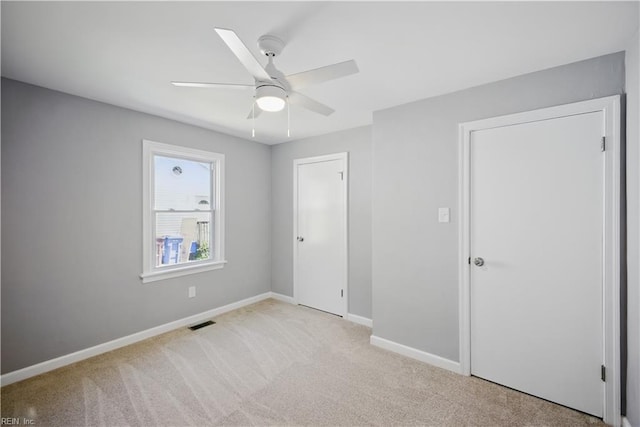 808 Williams Ave, Chesapeake, VA 23323 - unfurnished bedroom featuring light carpet, baseboards, and ceiling fan