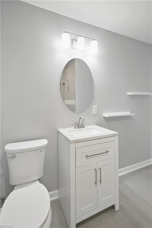 808 Williams Ave, Chesapeake, VA 23323 - bathroom with vanity, toilet, tile patterned floors, and baseboards
