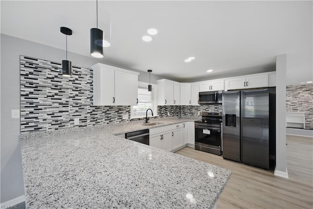 808 Williams Ave, Chesapeake, VA 23323 - kitchen featuring appliances with stainless steel finishes, a sink, light stone counters, decorative backsplash, and recessed lighting
