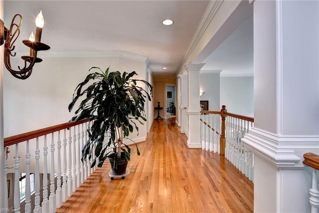 2081 Harpers Ml, Williamsburg, VA 23185 - hallway with light wood-style flooring, an upstairs landing, recessed lighting, crown molding, and decorative columns