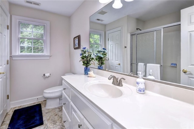 2081 Harpers Ml, Williamsburg, VA 23185 - bathroom featuring vanity, a shower stall, toilet, and baseboards