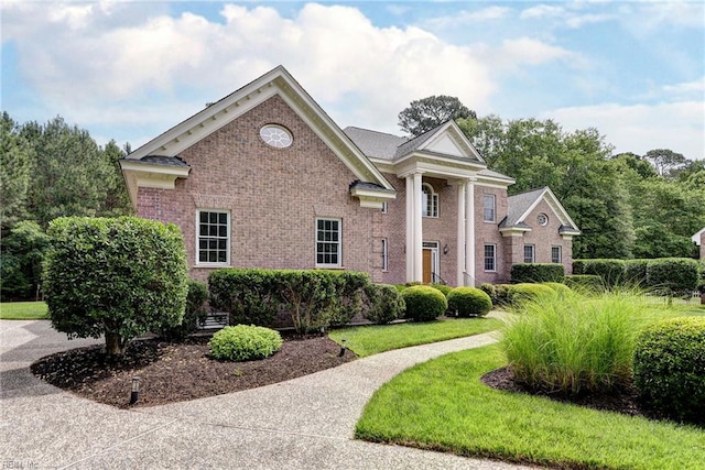 2081 Harpers Ml, Williamsburg, VA 23185 - neoclassical / greek revival house featuring brick siding and a front lawn