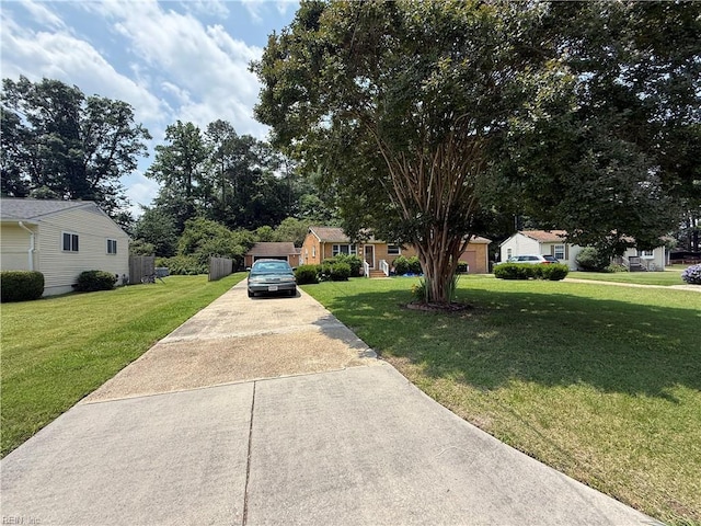 107 Carver Pl, Yorktown, VA 23692 - view of front facade with a front lawn and concrete driveway