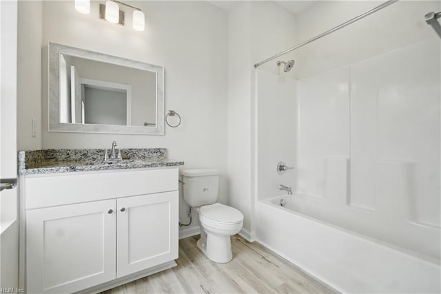 1245 Maltby Ave, Norfolk, VA 23504 - full bath featuring toilet, vanity, wood finished floors, shower / bathtub combination, and baseboards