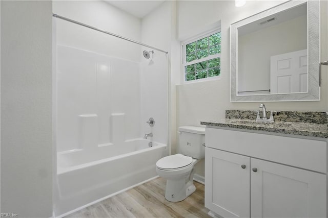 1245 Maltby Ave, Norfolk, VA 23504 - full bathroom featuring wood finished floors, vanity, toilet, and washtub / shower combination