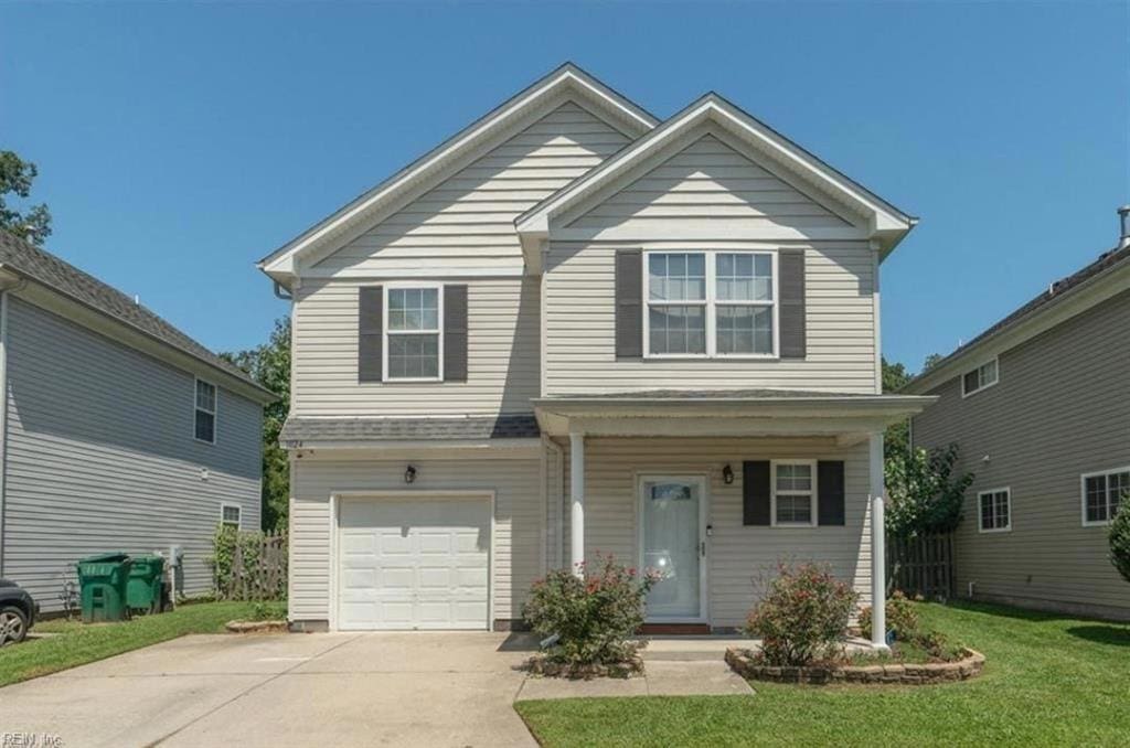 1024 Trestle Way, Chesapeake, VA 23324 - view of front of property with a front lawn, an attached garage, covered porch, and driveway