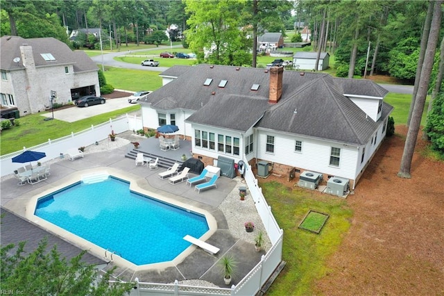 136 Wynnwood Dr, Franklin, VA 23851 - view of pool featuring a patio, a diving board, cooling unit, and outdoor dining space