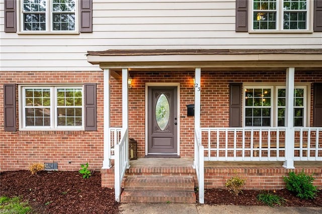 23 Signi Hi Ct, Newport News, VA 23601 - view of exterior entry with brick siding and a porch