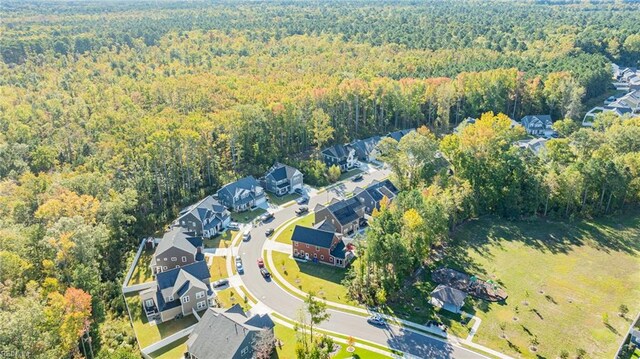 126 Secretariat Dr, Suffolk, VA 23435 - aerial perspective of suburban area featuring a forest