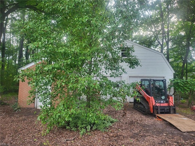 72 Cline Dr, Hampton, VA 23666 - view of side of property featuring a garage