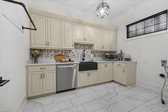 107 Gullane, Smithfield, VA 23430 - kitchen with stainless steel appliances, light marble finish flooring, cream cabinets, and a sink