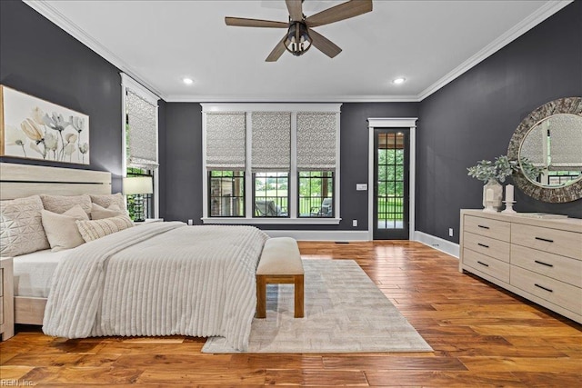 107 Gullane, Smithfield, VA 23430 - bedroom featuring ornamental molding, recessed lighting, baseboards, wood finished floors, and access to exterior