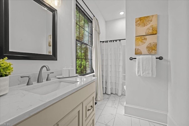 107 Gullane, Smithfield, VA 23430 - bathroom with marble finish floors, vanity, healthy amount of natural light, recessed lighting, and baseboards