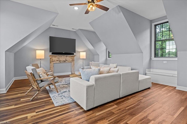 107 Gullane, Smithfield, VA 23430 - living room featuring wood finished floors, a ceiling fan, lofted ceiling, and baseboards