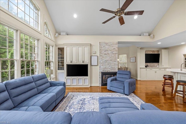 201 Royal Dornoch, Smithfield, VA 23430 - living area featuring high vaulted ceiling, a ceiling fan, a fireplace, recessed lighting, and light wood finished floors