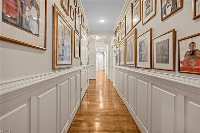 201 Royal Dornoch, Smithfield, VA 23430 - hall featuring a decorative wall, ornamental molding, recessed lighting, light wood-type flooring, and wainscoting