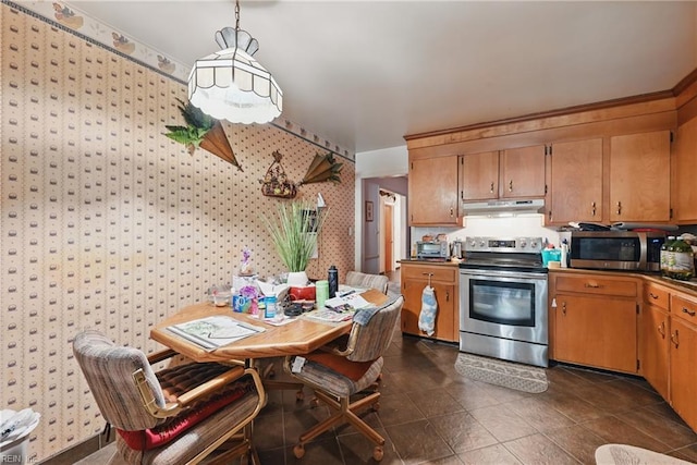 508 Crown Cres, Chesapeake, VA 23325 - kitchen featuring appliances with stainless steel finishes, under cabinet range hood, wallpapered walls, dark tile patterned flooring, and dark countertops