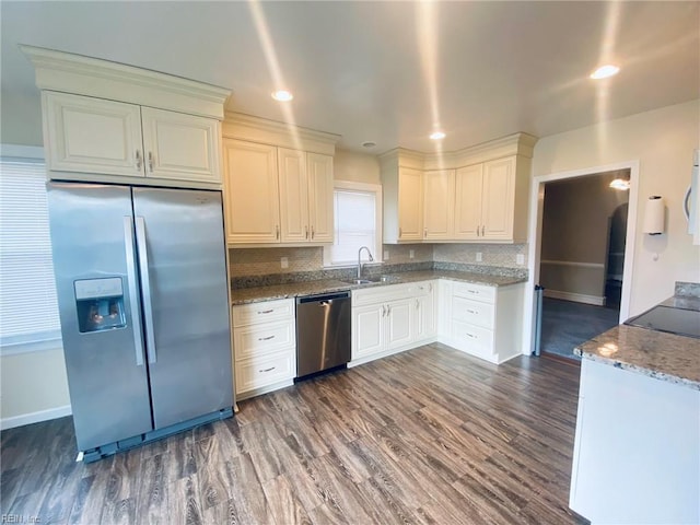 133 Chesterfield Rd, Hampton, VA 23661 - kitchen featuring stainless steel appliances, stone counters, backsplash, dark wood-style floors, and white cabinetry
