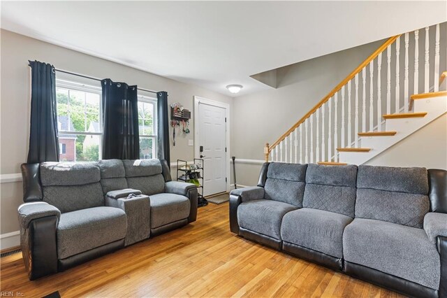 133 Chesterfield Rd, Hampton, VA 23661 - living room with light wood-style floors, stairway, and baseboards