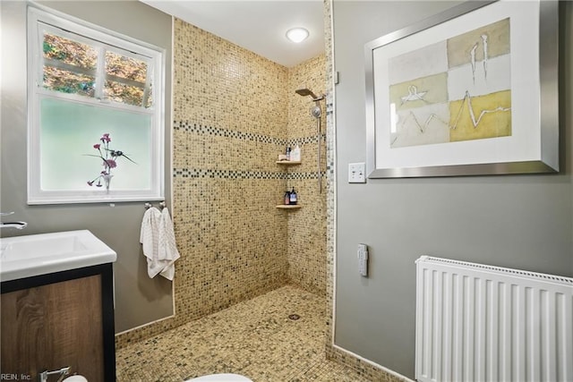 6076 Newport Pt, Norfolk, VA 23505 - full bath with radiator heating unit, a tile shower, and vanity