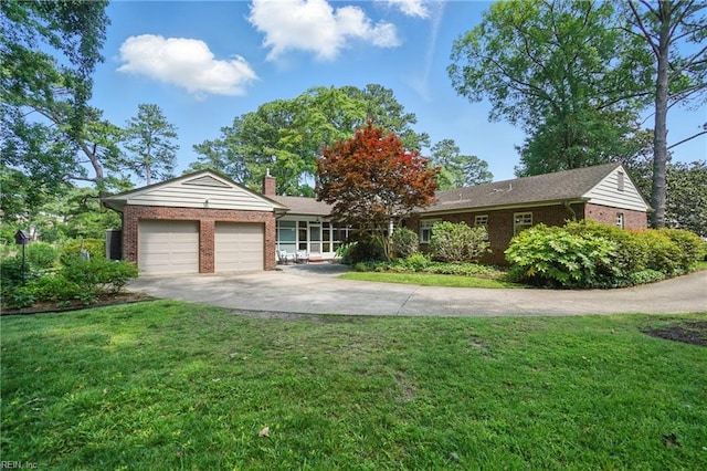6076 Newport Pt, Norfolk, VA 23505 - single story home with brick siding, driveway, an attached garage, and a chimney