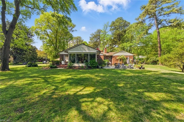 6076 Newport Pt, Norfolk, VA 23505 - view of green lawn featuring a patio area