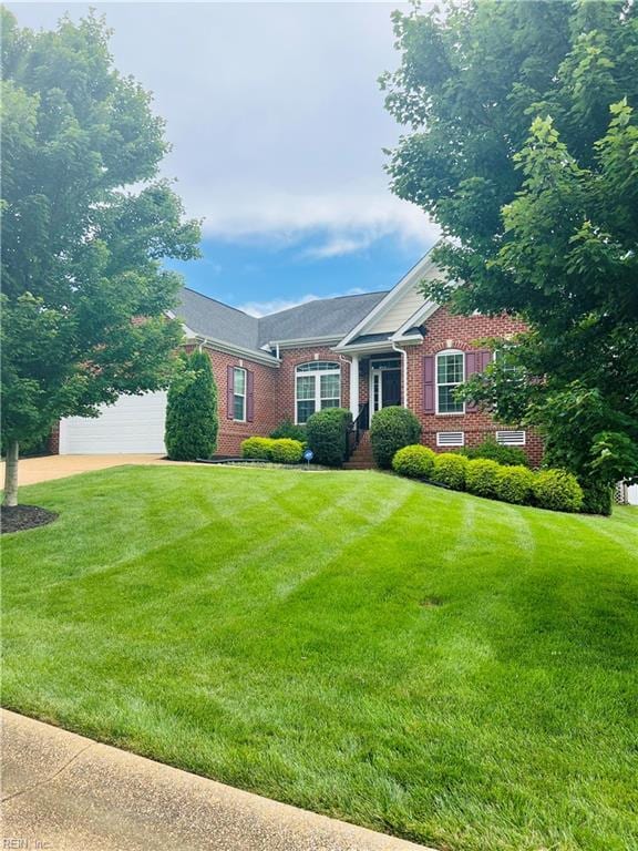 4296 Beamers Rdg, Williamsburg, VA 23188 - ranch-style home featuring brick siding, a front yard, a garage, and driveway
