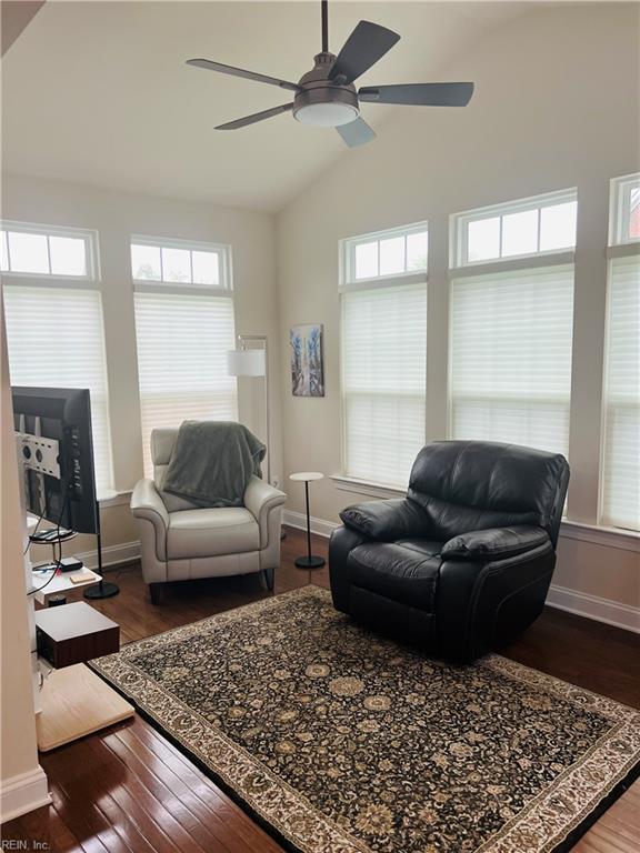 4296 Beamers Rdg, Williamsburg, VA 23188 - living room featuring vaulted ceiling, a ceiling fan, wood finished floors, and baseboards
