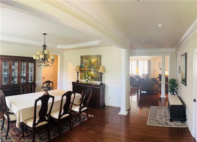 4296 Beamers Rdg, Williamsburg, VA 23188 - dining area featuring decorative columns, dark wood finished floors, a chandelier, ornamental molding, and wainscoting