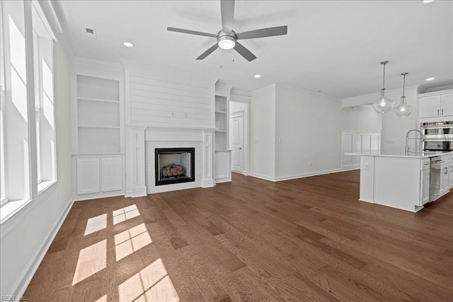 206 84th St Unit A, Virginia Beach, VA 23451 - unfurnished living room with ceiling fan, crown molding, recessed lighting, baseboards, and a fireplace