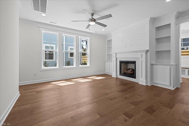 206 84th St Unit A, Virginia Beach, VA 23451 - unfurnished living room with a ceiling fan, baseboards, a fireplace, ornamental molding, and built in shelves