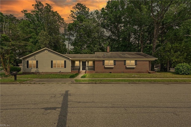 1202 Land St, Norfolk, VA 23502 - ranch-style home with a chimney, crawl space, and a front yard