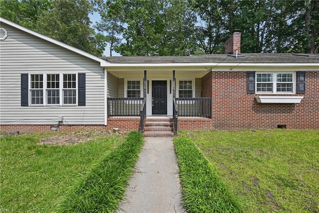 1202 Land St, Norfolk, VA 23502 - ranch-style house featuring crawl space, covered porch, a front yard, and a chimney