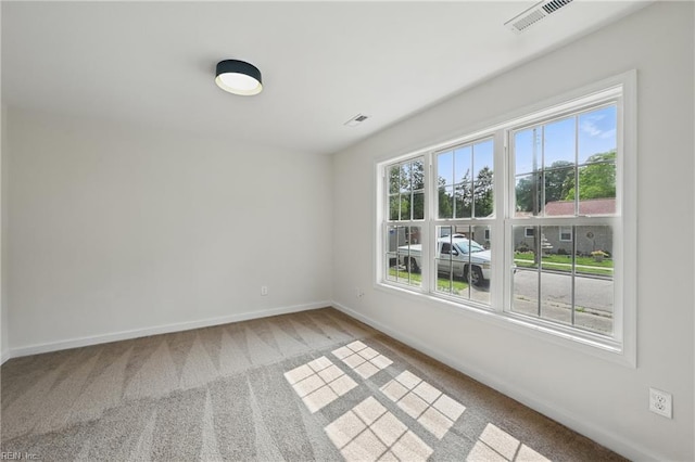 1202 Land St, Norfolk, VA 23502 - carpeted spare room with baseboards