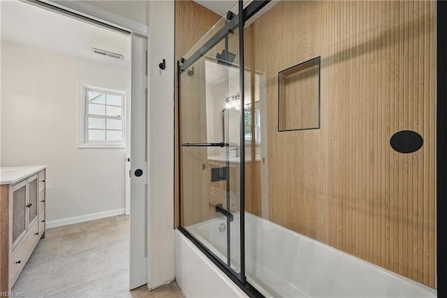 1202 Land St, Norfolk, VA 23502 - bathroom featuring enclosed tub / shower combo, vanity, and baseboards