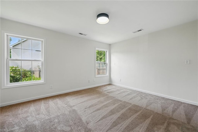 1202 Land St, Norfolk, VA 23502 - carpeted spare room with baseboards