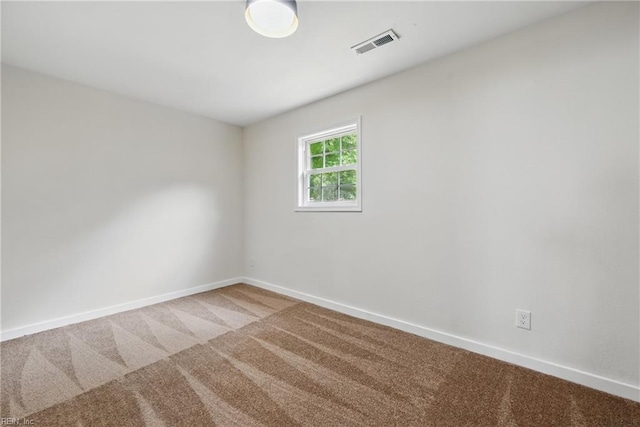 1202 Land St, Norfolk, VA 23502 - carpeted empty room featuring baseboards