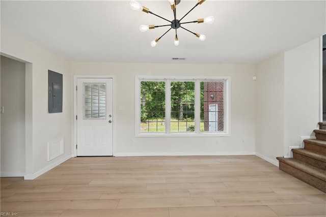 1202 Land St, Norfolk, VA 23502 - foyer featuring electric panel, light wood-type flooring, baseboards, a chandelier, and stairway