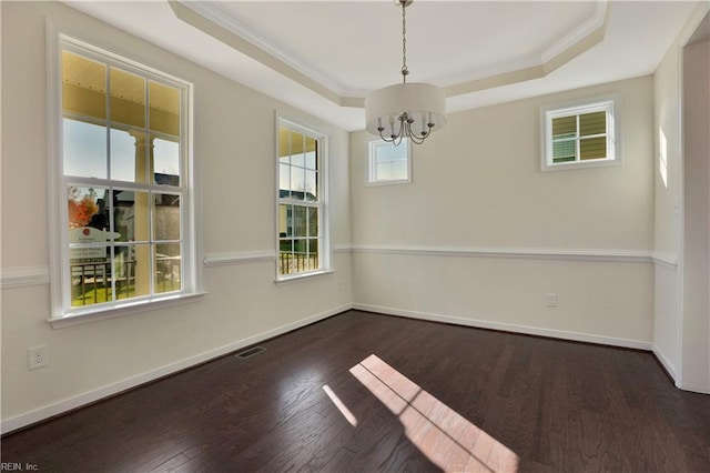 2221 Patrick Dr, Suffolk, VA 23435 - empty room featuring a chandelier, a raised ceiling, crown molding, dark wood-style floors, and baseboards
