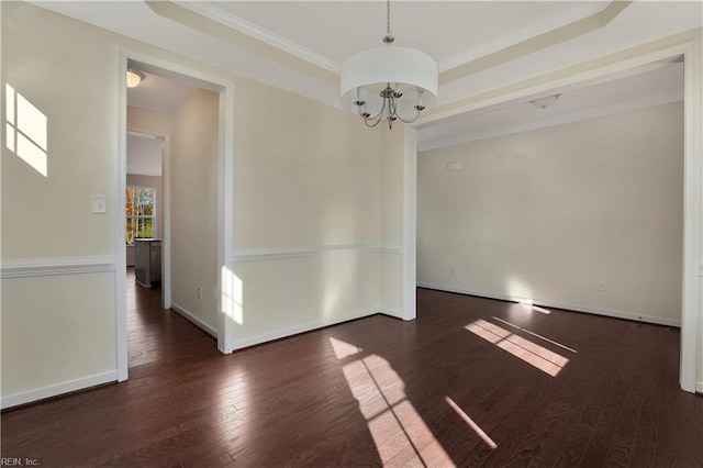 2221 Patrick Dr, Suffolk, VA 23435 - empty room featuring wood finished floors, a chandelier, baseboards, and crown molding