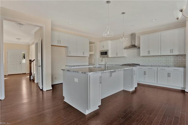 2221 Patrick Dr, Suffolk, VA 23435 - kitchen with wall chimney range hood, dark wood-style flooring, white cabinets, and a sink