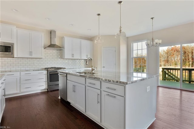 2221 Patrick Dr, Suffolk, VA 23435 - kitchen with wall chimney range hood, a sink, appliances with stainless steel finishes, white cabinets, and dark wood-type flooring