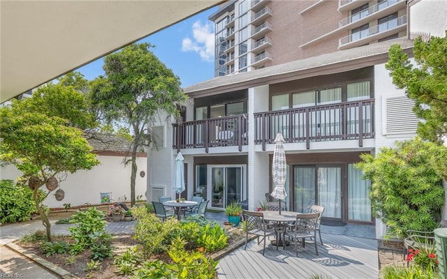 4004 Atlantic Ave Unit Cs9, Virginia Beach, VA 23451 - back of house with a balcony and outdoor dining space