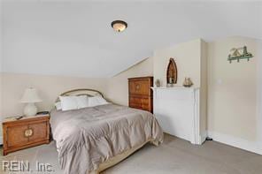 96 Doctors Creek Rd, New Point, VA 23125 - carpeted bedroom with lofted ceiling and baseboards