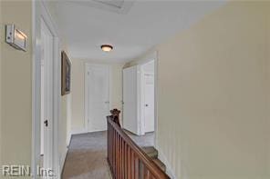 96 Doctors Creek Rd, New Point, VA 23125 - hallway featuring an upstairs landing and attic access