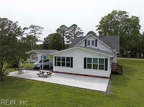 96 Doctors Creek Rd, New Point, VA 23125 - back of property with a patio and a yard