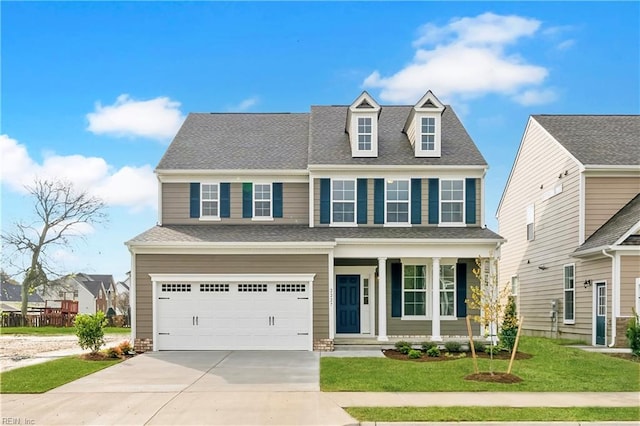 2030 Canvasback Dr, Suffolk, VA 23435 - view of front of property featuring covered porch, driveway, an attached garage, a front lawn, and a shingled roof