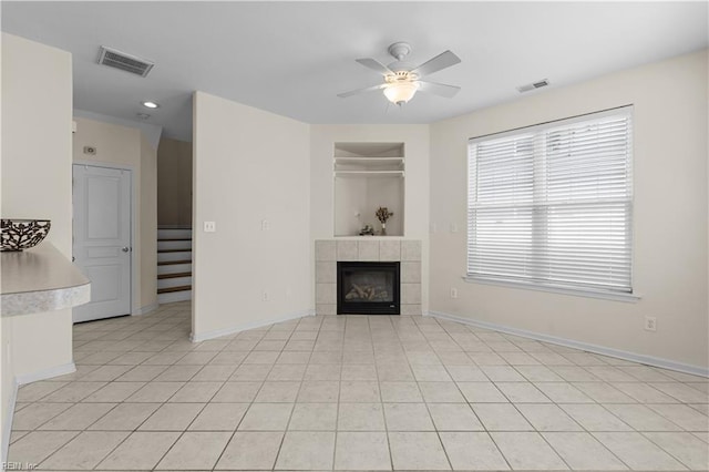 4700 Martinique Ct Unit 12, Virginia Beach, VA 23455 - unfurnished living room with ceiling fan, a tiled fireplace, baseboards, and recessed lighting